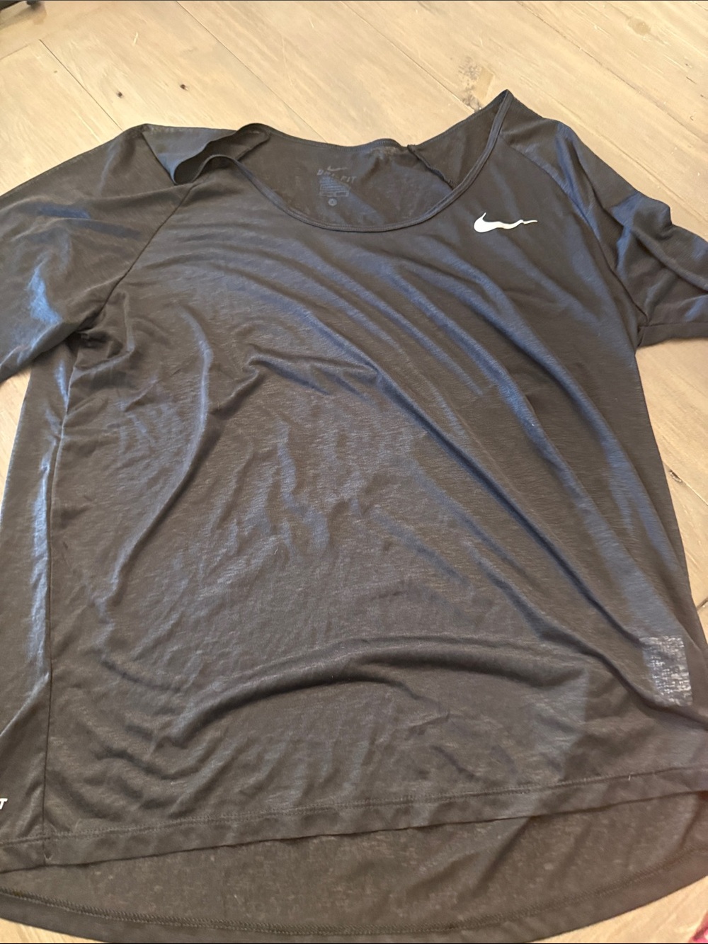 Nike Black Short Sleeve Performance Tee with White Swoosh
Sheer
Large
